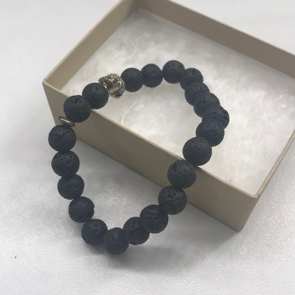 Black lava stone bracelet with Buddha head